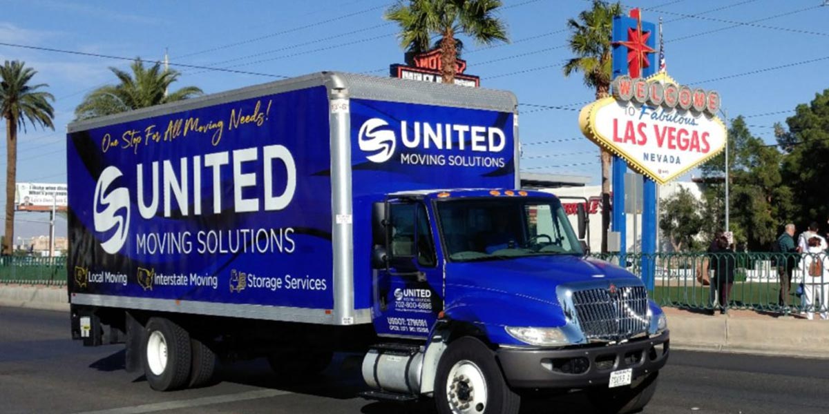 United Moving Solutions truck in front of Las Vegas sign