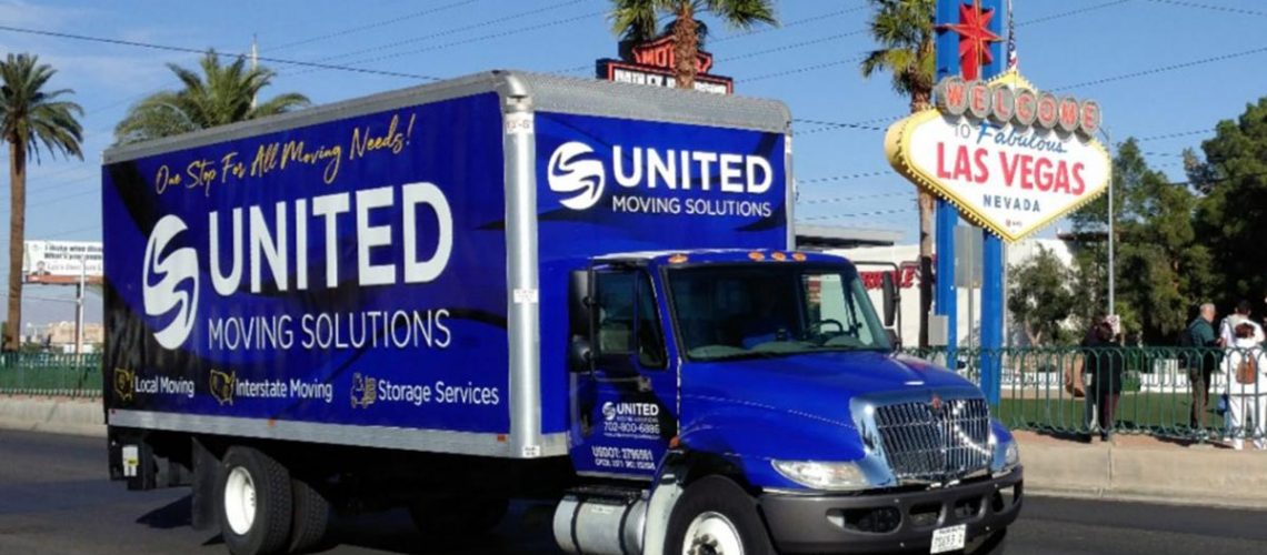 United Moving Solutions truck in front of Las Vegas sign